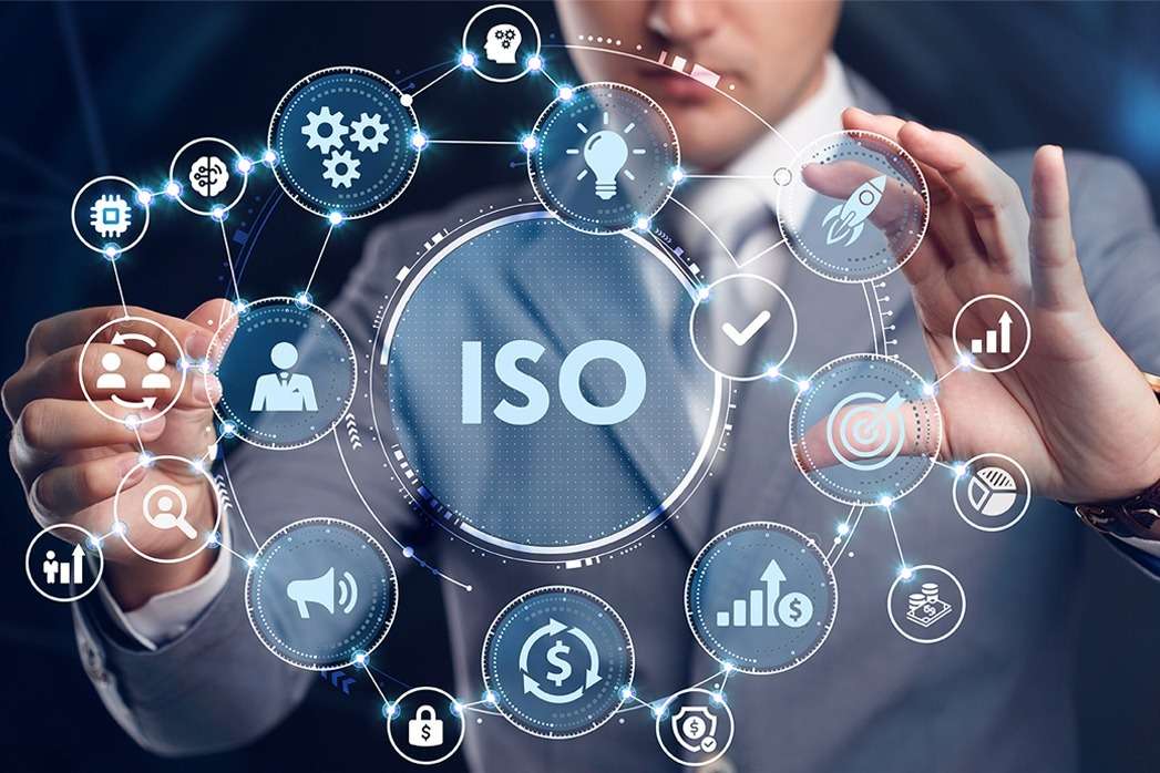 An image of a businessman holding up a crypto icon.