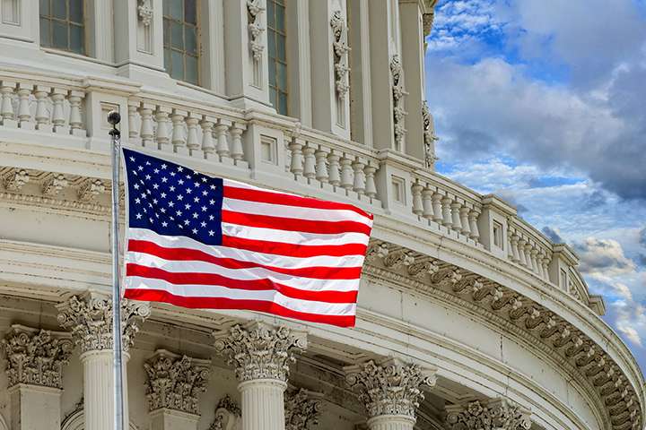 A white building with a crypto flag.