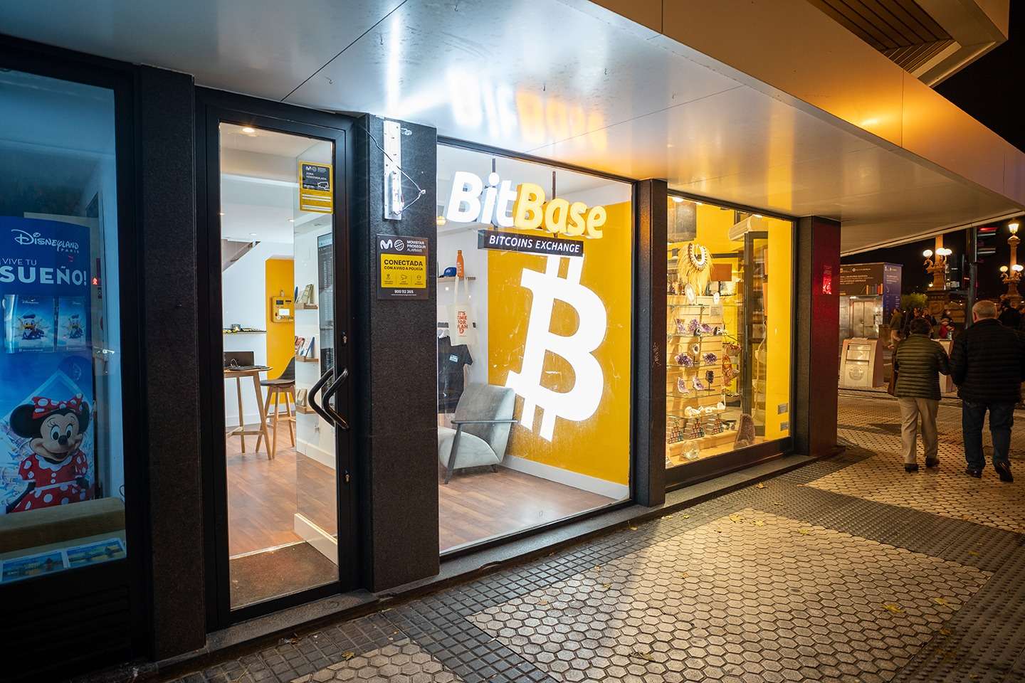 A store displaying a prominent bitcoin sign, representing the growing significance of cryptocurrency in the UKcrypto community.