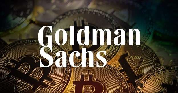 The words goldman sachs on a background of bitcoin.