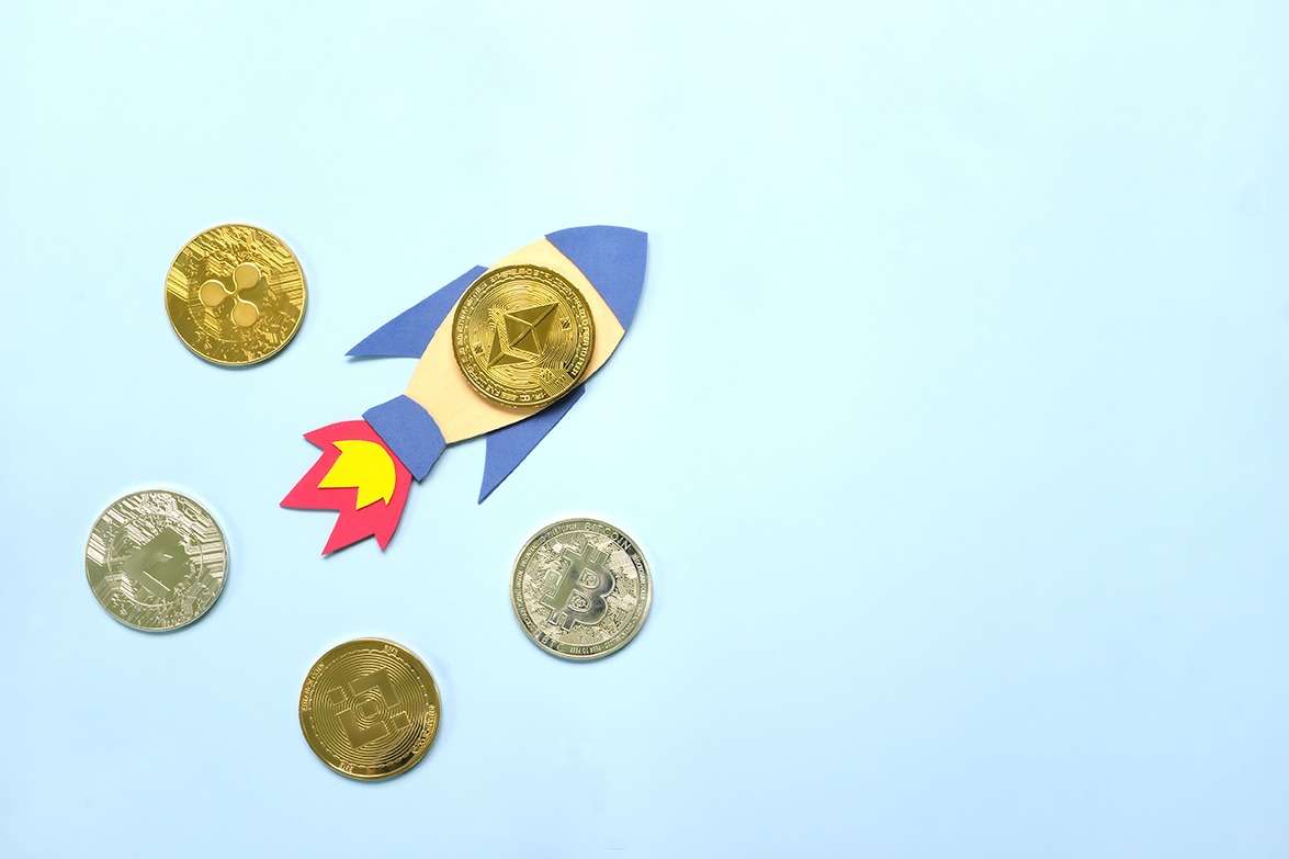 An Ether rocket with coins skyrockets in the air. Eth on a bull run.
