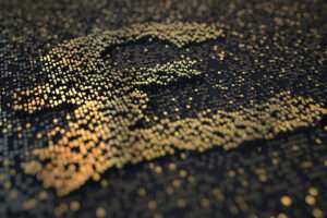 A digital pound sign on a black background. Britcoin UK based Stablecoin.