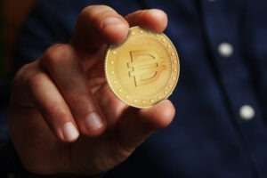 Man holds a Dai (DAI) stablecoin.