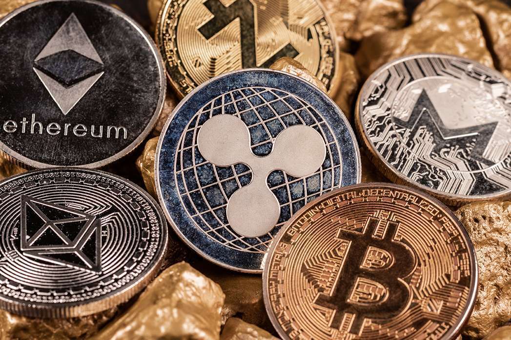 Bitcoin cryptocurrency and altcoins with gold nuggets. Investment and store of value concept.