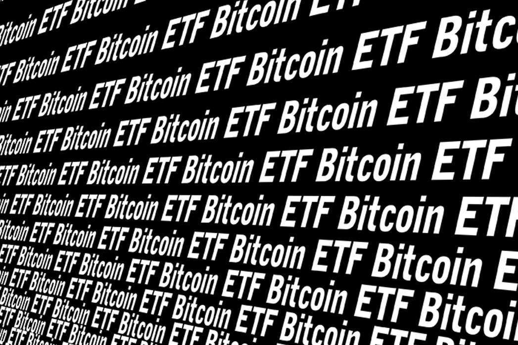 Bitcoin ETF on black background.