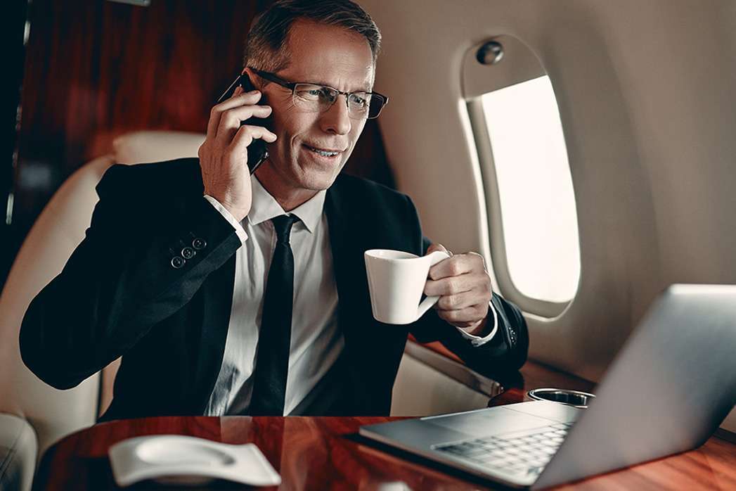 Businessman in private jet.