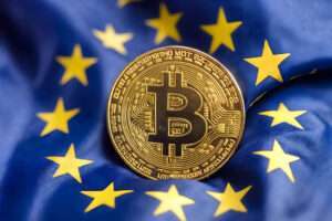 European union flag and Bitcoin. Europe cryptocurrency, digital gold finance investment regulation.
