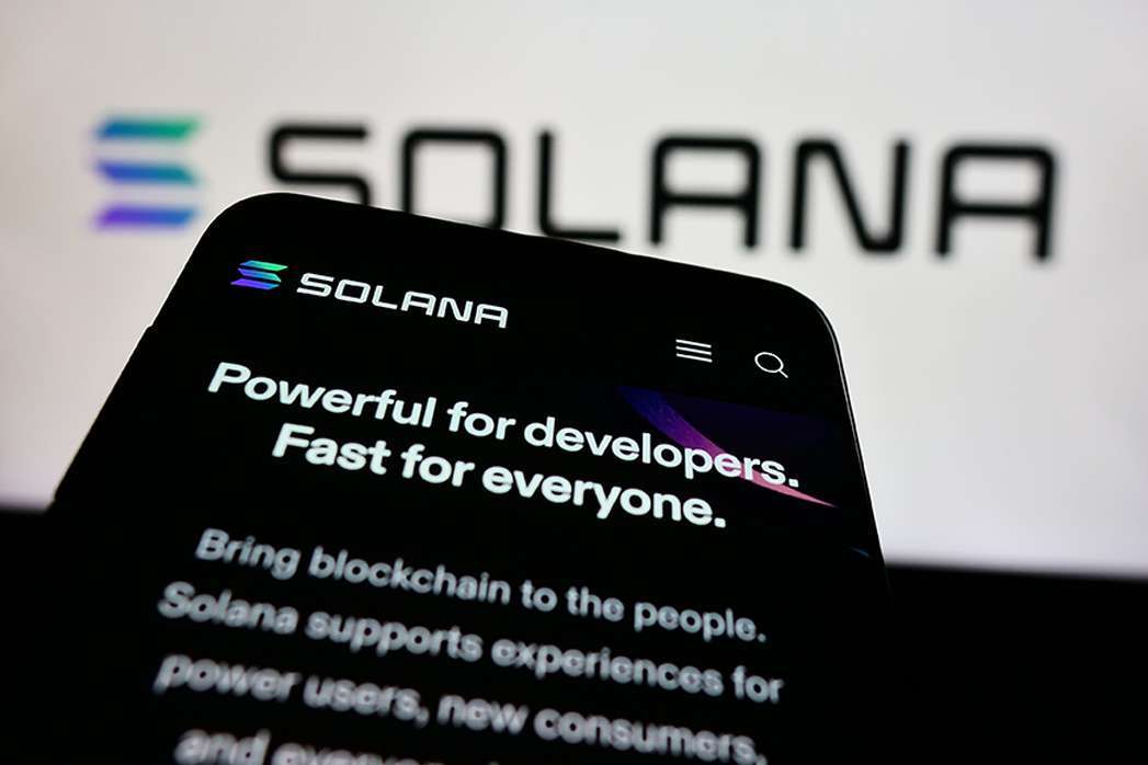 tuttgart, Germany - 08-18-2024: Smartphone with website of blockchain platform company Solana in front of business logo. Focus on top-left of phone display.