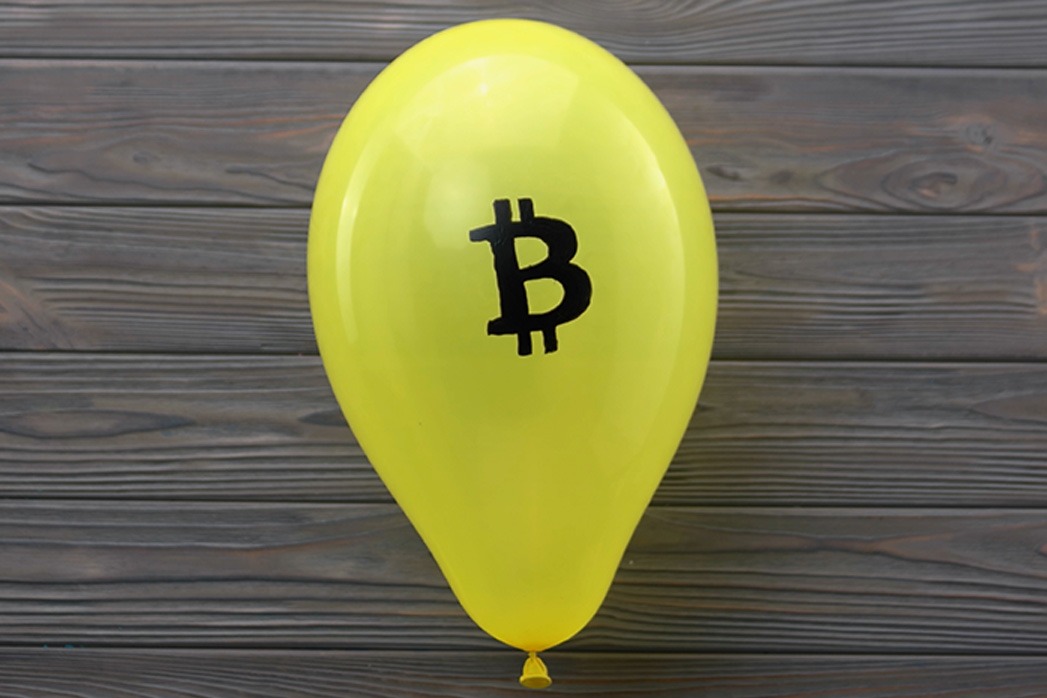 Yellow balloon with a Bitcoin sign.