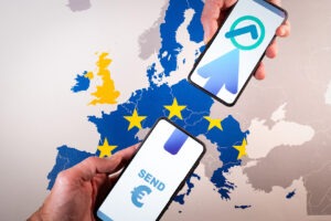 Smartphone screens displaying euro symbol and transfer icon over map of Europe, symbolising The Instant Payments Regulation and ensuring euro money transfers arrive within ten seconds.