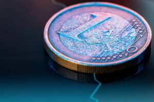 Euro coin on stock chart. Financial investment concept.