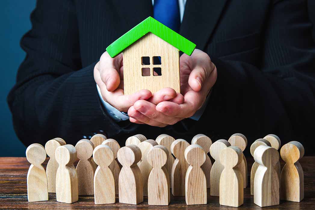 Providing a home. Bank agent approving mortgage loan.