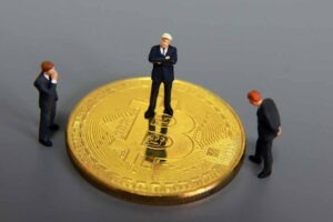 Bitcoin and Miniature People. Bitcoin Investment Concept.