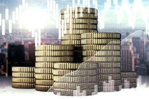 Golden Coins On Abstract City And Business Chart Background. Finance And Forex Concept. Double.