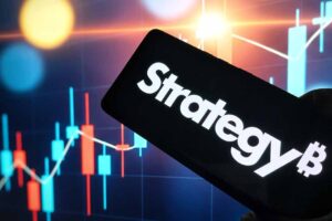 Cryptocurrency trading strategy on mobile device with stock market graph.