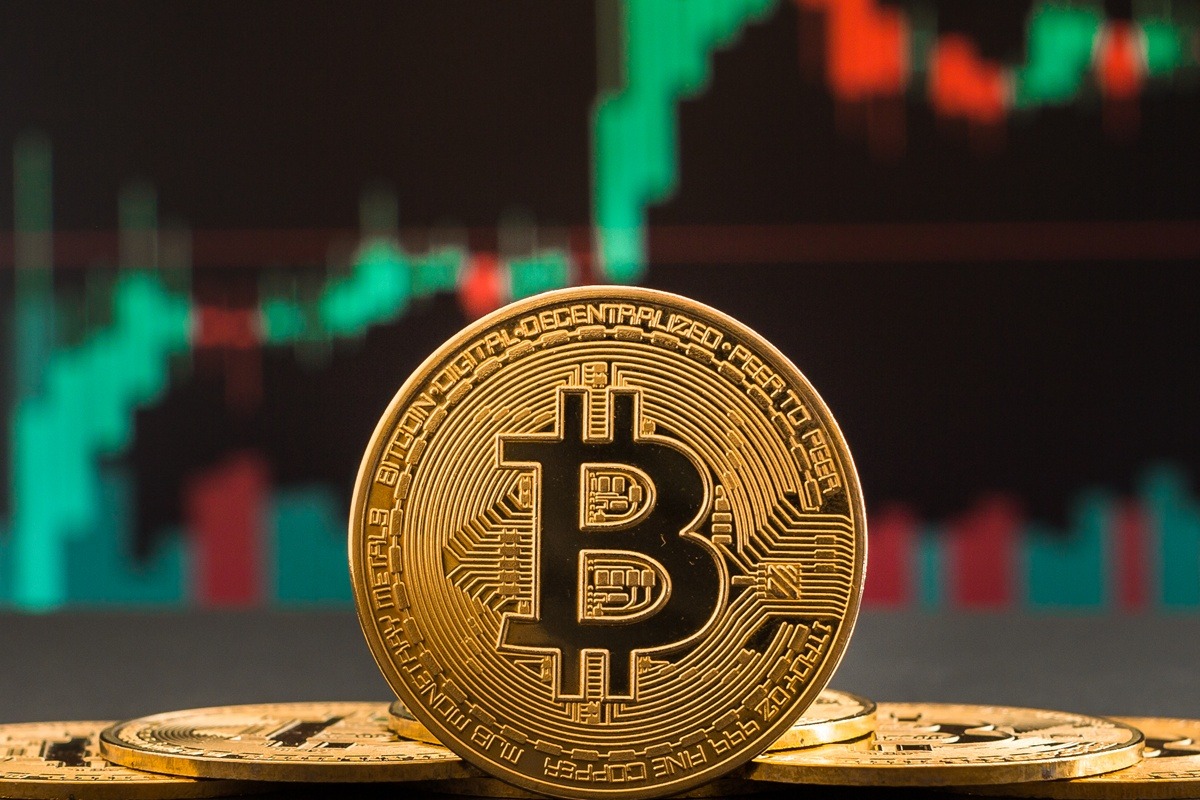 bitcoin-crypto-coin-with-financial-chart-background